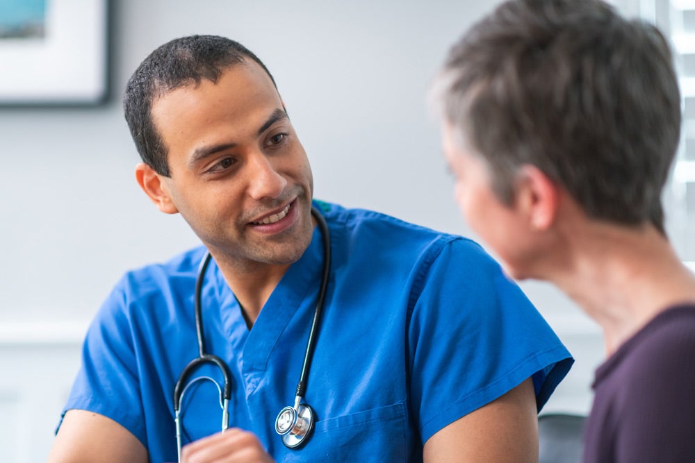 Doctor talking to a patient